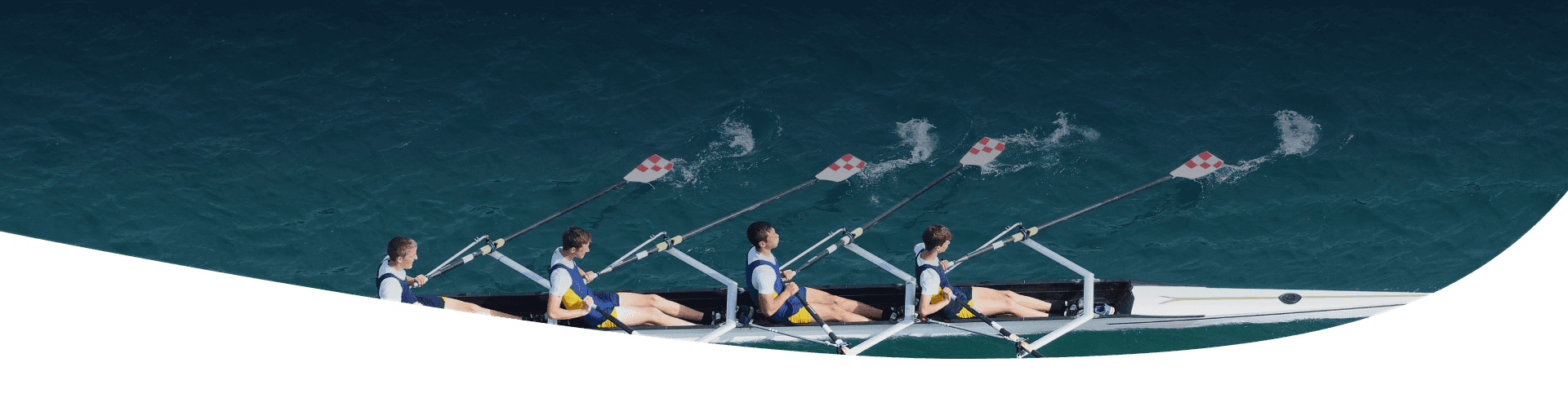 Four men in the boat long tail on the sea top view of man padding