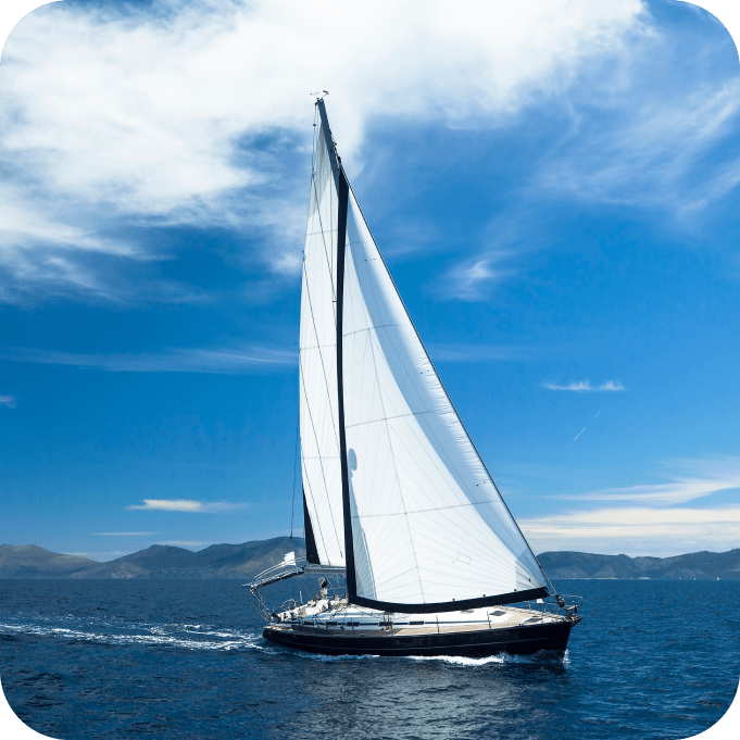 Sailing ship yachts with white sails in the sea